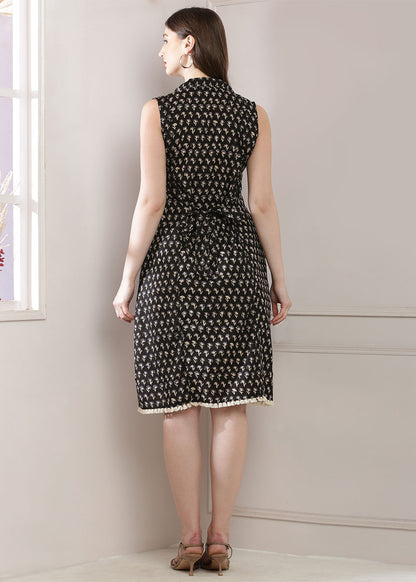 Black Dress Featuring A Shirt Collar And A Stylish Belt