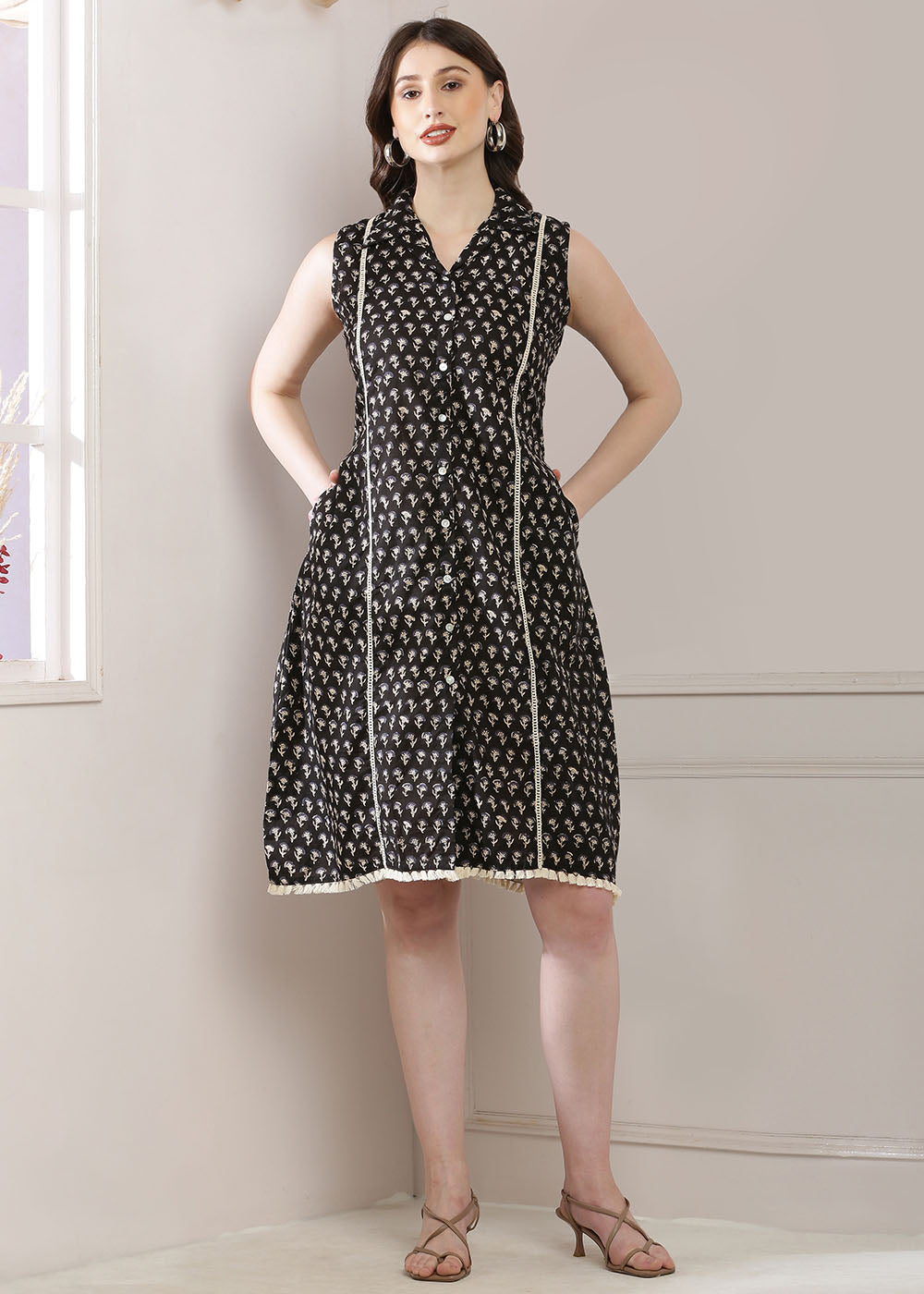 Black Dress Featuring A Shirt Collar And A Stylish Belt