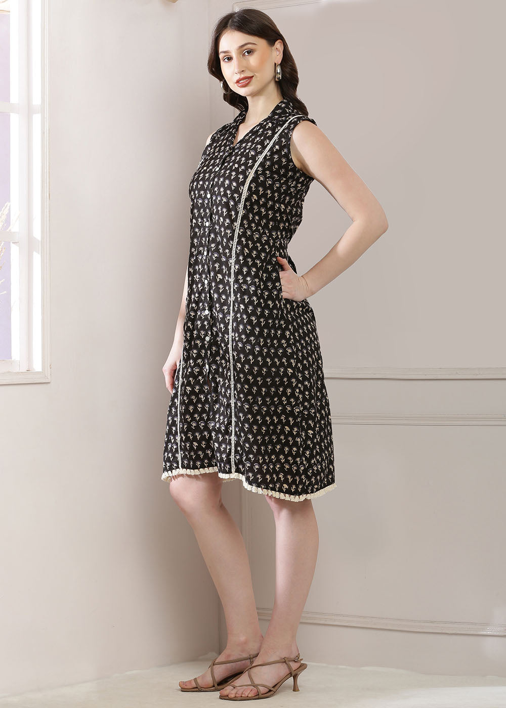 Black Dress Featuring A Shirt Collar And A Stylish Belt