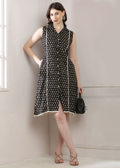 Black Dress Featuring A Shirt Collar And A Stylish Belt